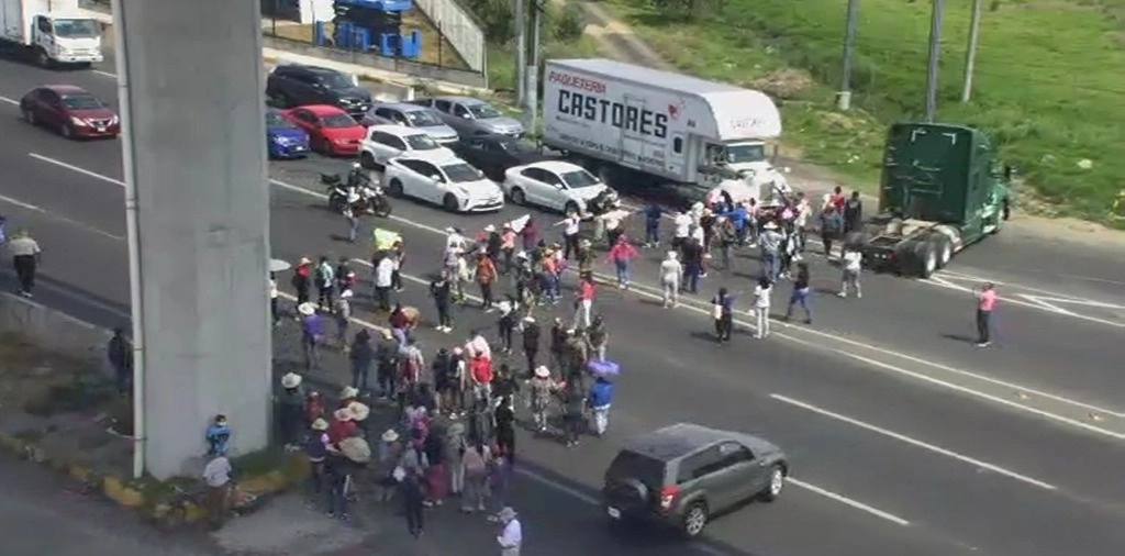 Bloquean simpatizantes de MC la carretera México-Toluca, por presunto fraude electoral